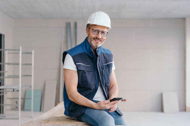 Confident friendly builder or engineer stock photo