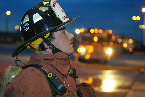 Tinley Park, Illinois, United States.  29 April, 2003.  Captain Tim Griffin takes a break from a fighting exercise at Fire Training Tower on 183rd Street in Tinley Park.
