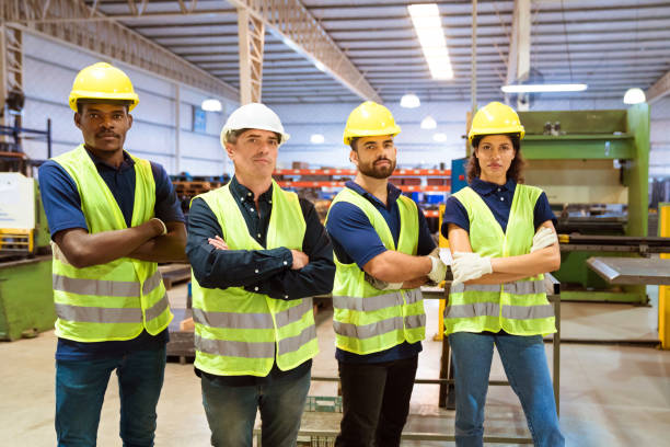 istock Portrait of confident engineers in industry 1176513179