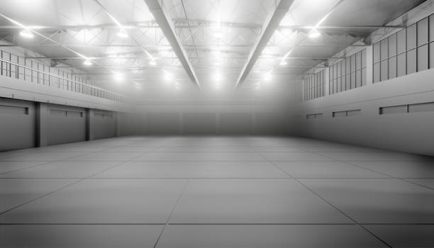 istock Modern empty dark storehouse with smoke at the end 1176514096