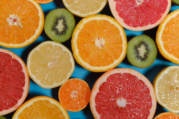 istock Fresh summer fruits on blue background 1176514665