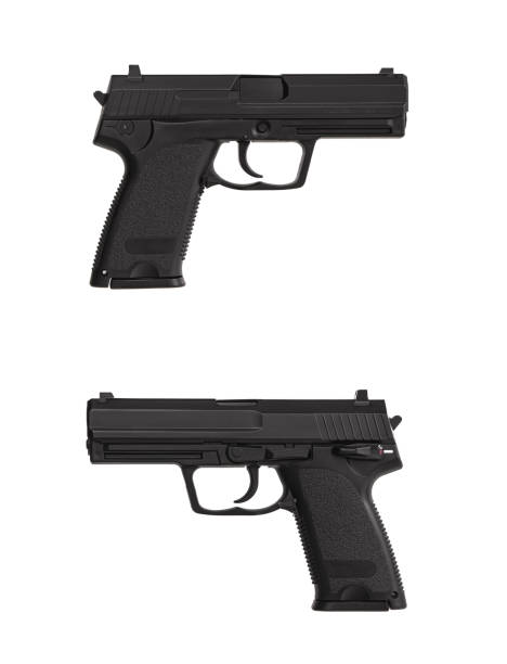 istock Black gun pistol isolated on white background 1176514704