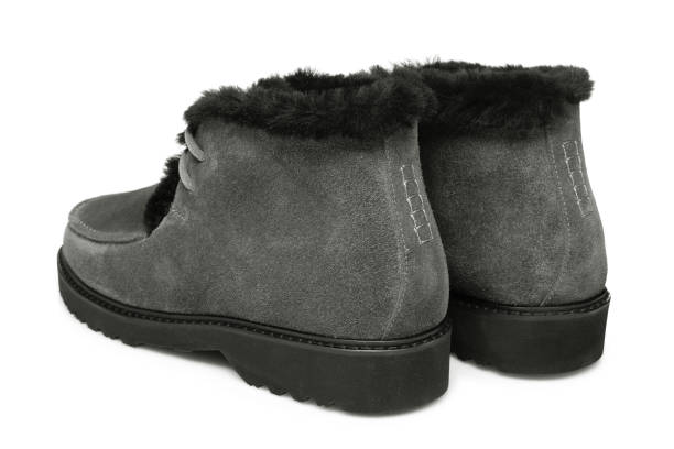 istock pair of gray suede boots, back side, white background, winter shoes 1176515320