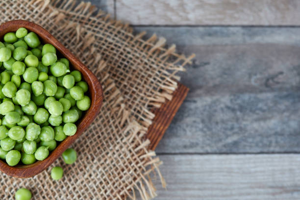 istock Fresh raw green peas 1176515919