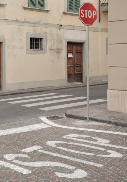 istock Intersection with STOP sign and pedestrian crossing 1176517866