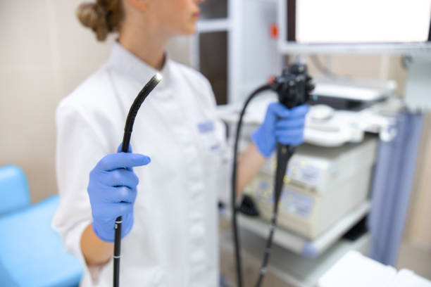 Doctor is using endoscopy machine stock photo