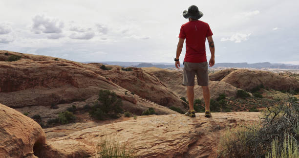 istock Man hiking near Canyonlands, Moab 1176520767
