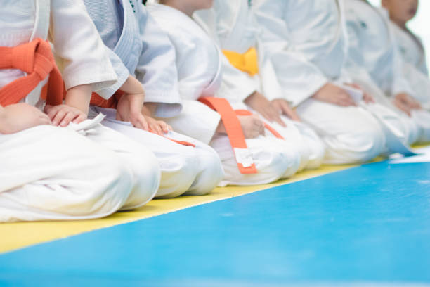 istock Kids playing judo in china 1176523581