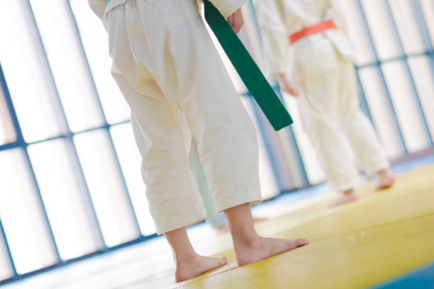 istock Kids playing judo in china 1176523704