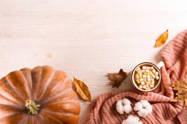 istock Autumnal top view composition with fall season symbolics on textured background. 1176523962