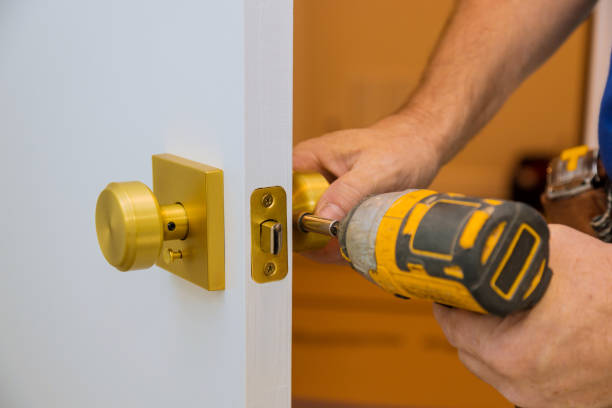 istock Installation with a lock in the door leaf using an drill screwdriver,for holding screws 1176524453