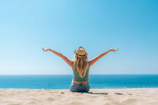 istock Blond woman get rest on the beautiful beach 1176532131