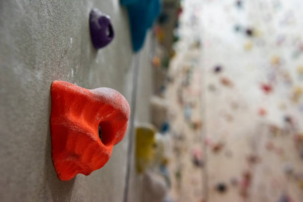 Indoor climbing wall Indoor climbing wall crag stock pictures, royalty-free photos & images