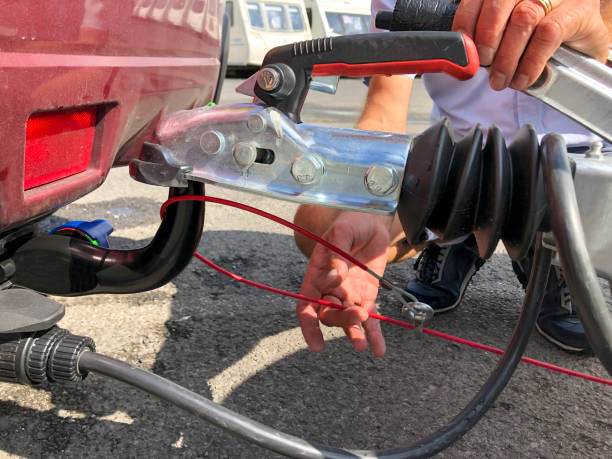 Checking the breakaway cable between a car and a caravan