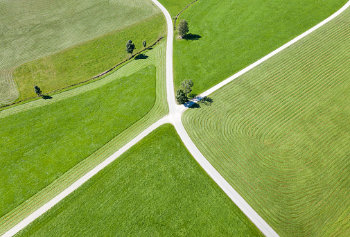 Aerial of Roads crossing with farm land on the side. Copy Space. Converted from RAW.