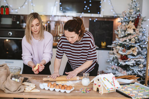 istock Best friends making Gingerbread cookies for Christmas 1176544086
