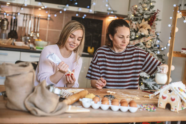istock Best friends making Gingerbread cookies for Christmas 1176544883