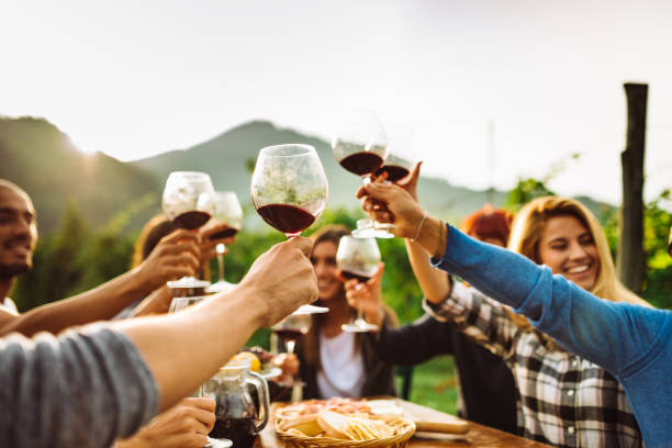 istock friends doing a wine tasting all together 1176549114