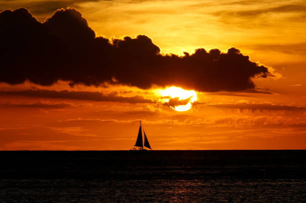 istock Sunset with Sailing Boat on Indian Ocean in Mauritius 1176549771