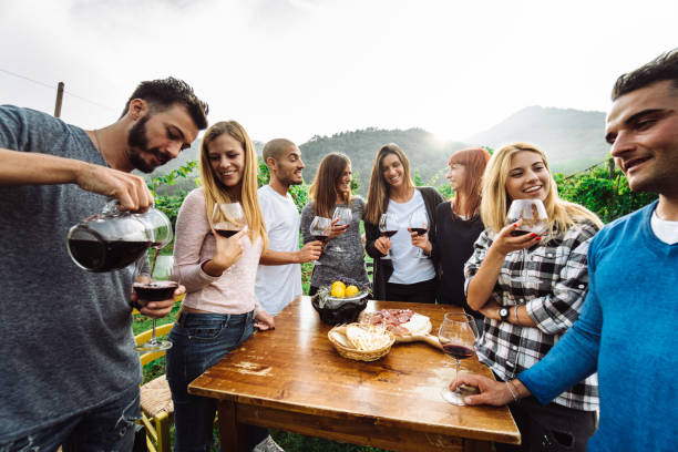 istock friends doing a wine tasting all together 1176549912