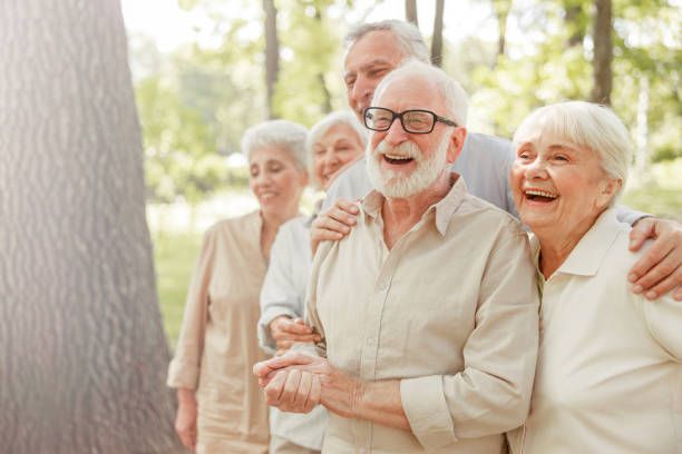 istock Happy mature people standing on the street 1176557095