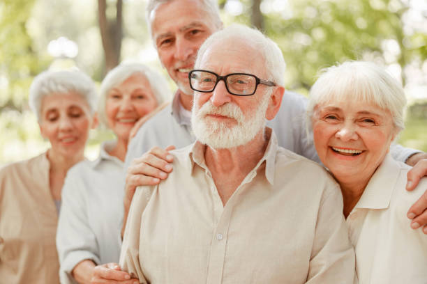 istock Smiling senior people standing on the street 1176557106