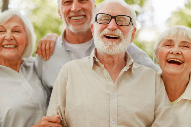 istock Joyful elderly people standing on the street 1176557130