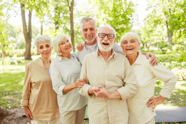 istock Cheerful mature people standing on the street 1176557131