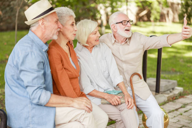 istock Cheerful old people making selfie on the street 1176557507