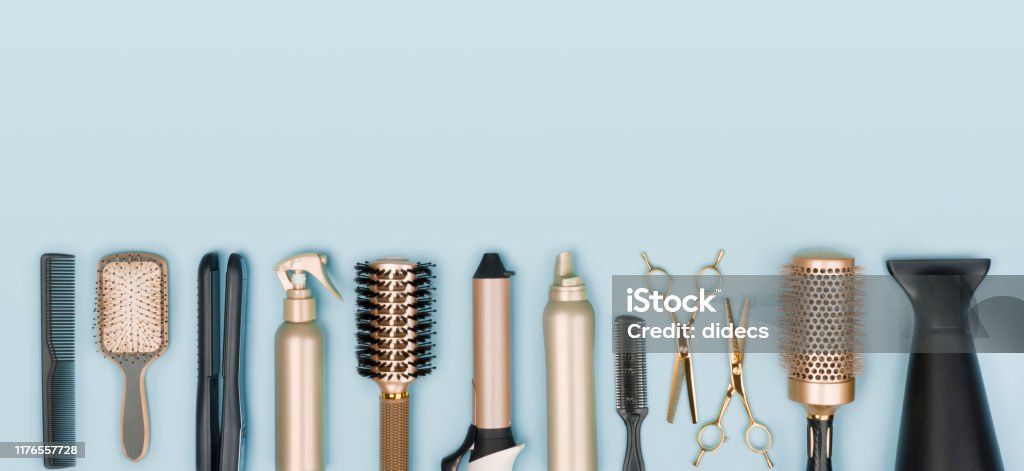 Hair Stylist Tools Arranged In A Line On Blue Background Stock Photo -  Download Image Now - iStock