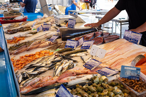 Central fish market with displays and counters with various seafood.in Athens, Greece. Retail place of healthy food.