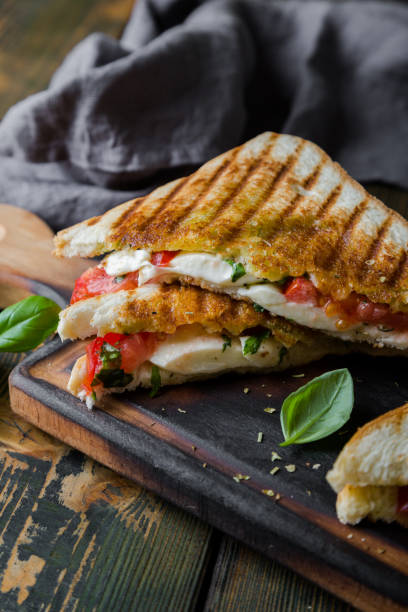 istock Sandwiches with mozzarella, basil and tomatoes. Italian sandwich 1176560331
