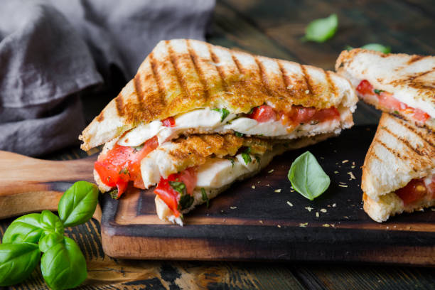 istock Sandwiches with mozzarella, basil and tomatoes. Italian sandwich 1176560410
