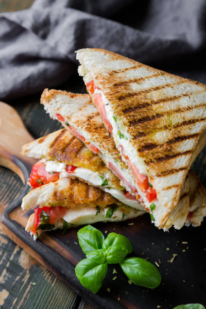istock Sandwiches with mozzarella, basil and tomatoes. Italian sandwich 1176560517