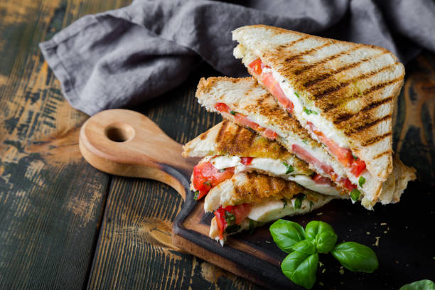 istock Sandwiches with mozzarella, basil and tomatoes. Italian sandwich 1176560566