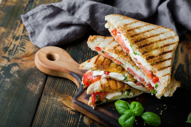 istock Sandwiches with mozzarella, basil and tomatoes. Italian sandwich 1176560653