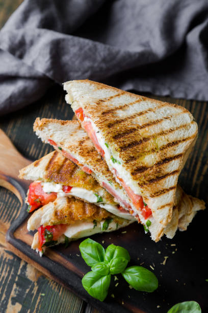 istock Sandwiches with mozzarella, basil and tomatoes. Italian sandwich 1176560677