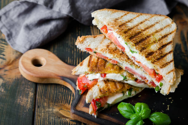 istock Sandwiches with mozzarella, basil and tomatoes. Italian sandwich 1176560763