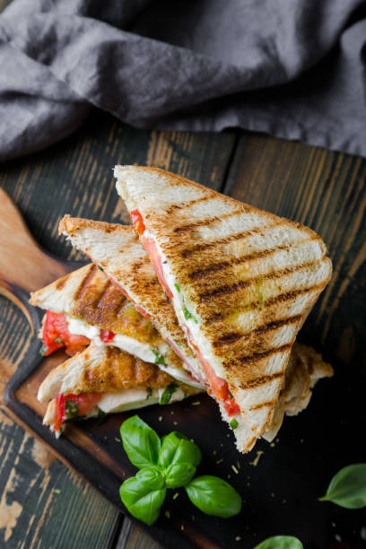 istock Sandwiches with mozzarella, basil and tomatoes. Italian sandwich 1176560783