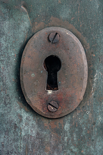 Old rusty key hole in a iron door from an old church in Sweden