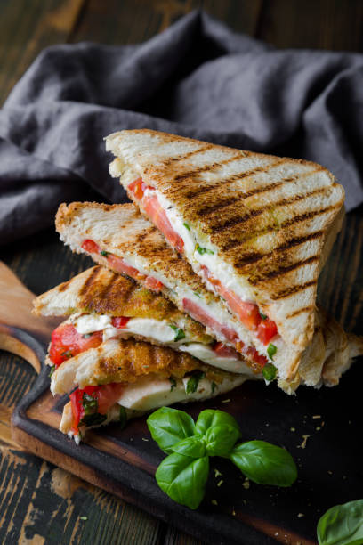 istock Sandwiches with mozzarella, basil and tomatoes. Italian sandwich 1176560890