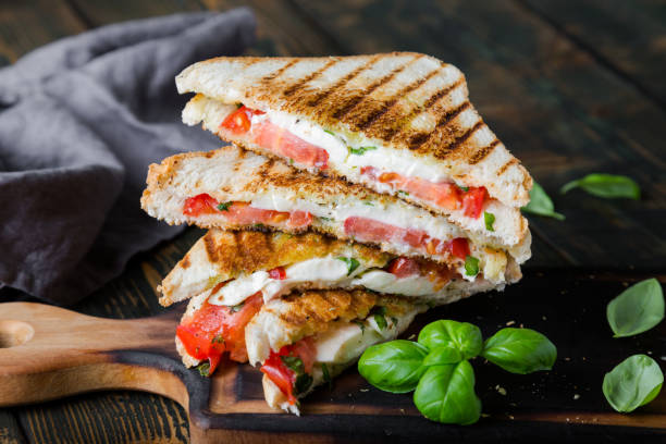 istock Sandwiches with mozzarella, basil and tomatoes. Italian sandwich 1176561045