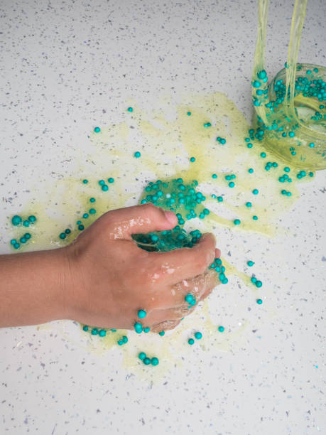 istock The child playing slime in happy time, selective focus 1176561997