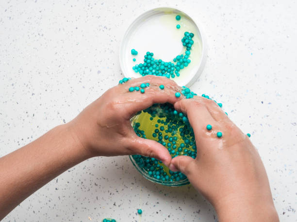 istock The child playing slime in happy time, selective focus 1176562027