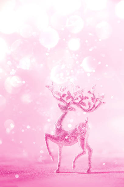 istock Silver glitter Christmas deer on neon pink background with lights bokeh, copy space. Greeting card for new year party. Festive holiday concept. Banner 1176562072