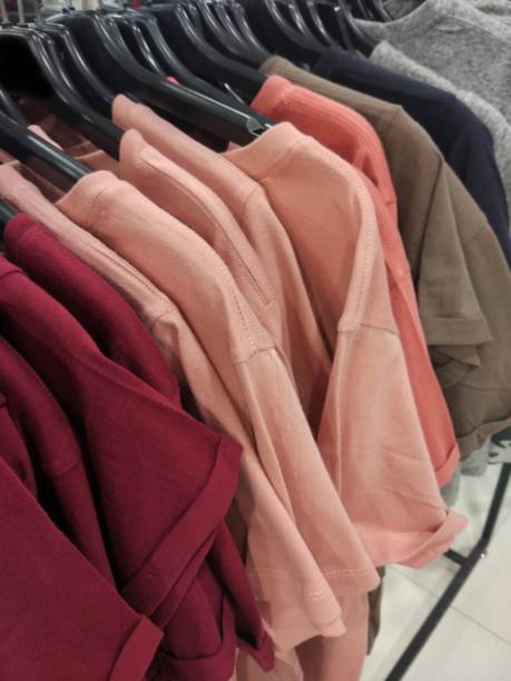 istock Clothes hanging in the clothes store 1176562519