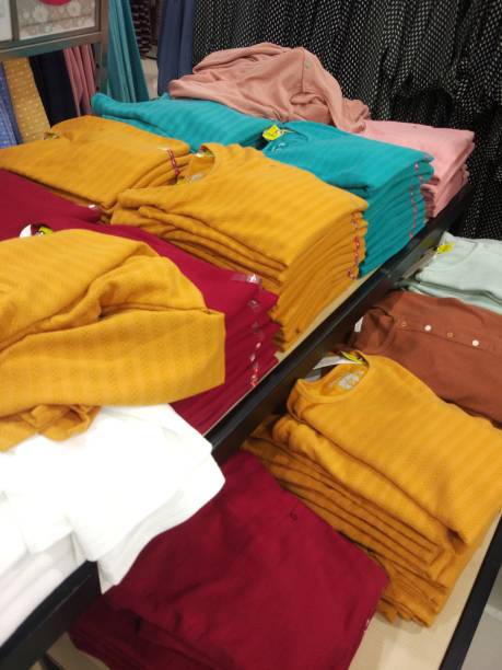 istock Clothes hanging in the clothes store 1176562563