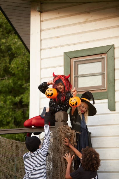 istock Kids Running Away on Halloween 1176567890