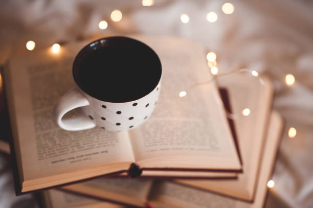 istock Cup of tea on books 1176568122