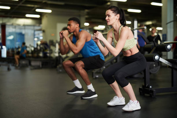 istock Sportive Couple Working Out Together 1176569519